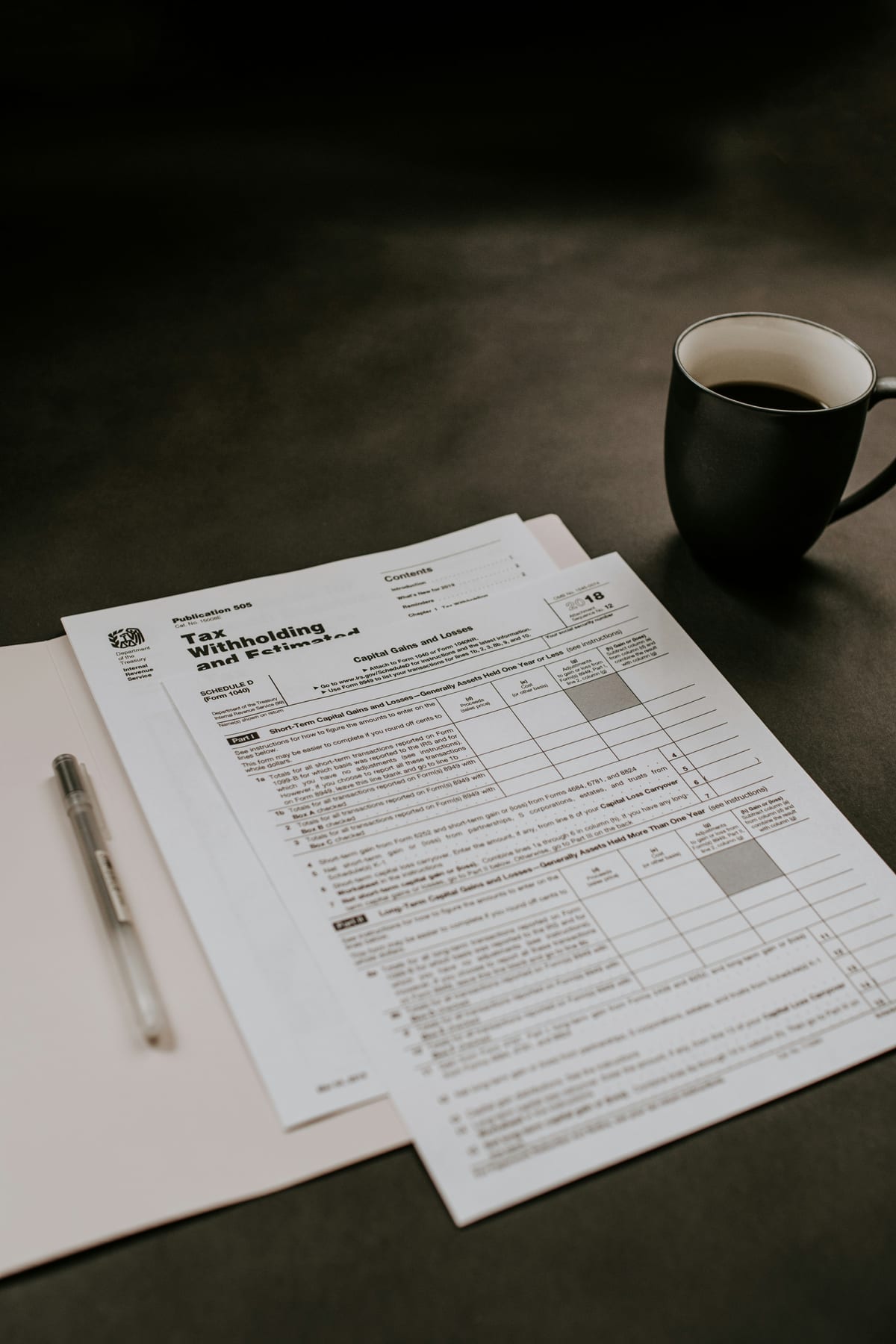 IRS Publication 505 and Schedule D Form 1040 tax documents — regulatory framework for Gold IRA compliance — Vault Retirement Guide
